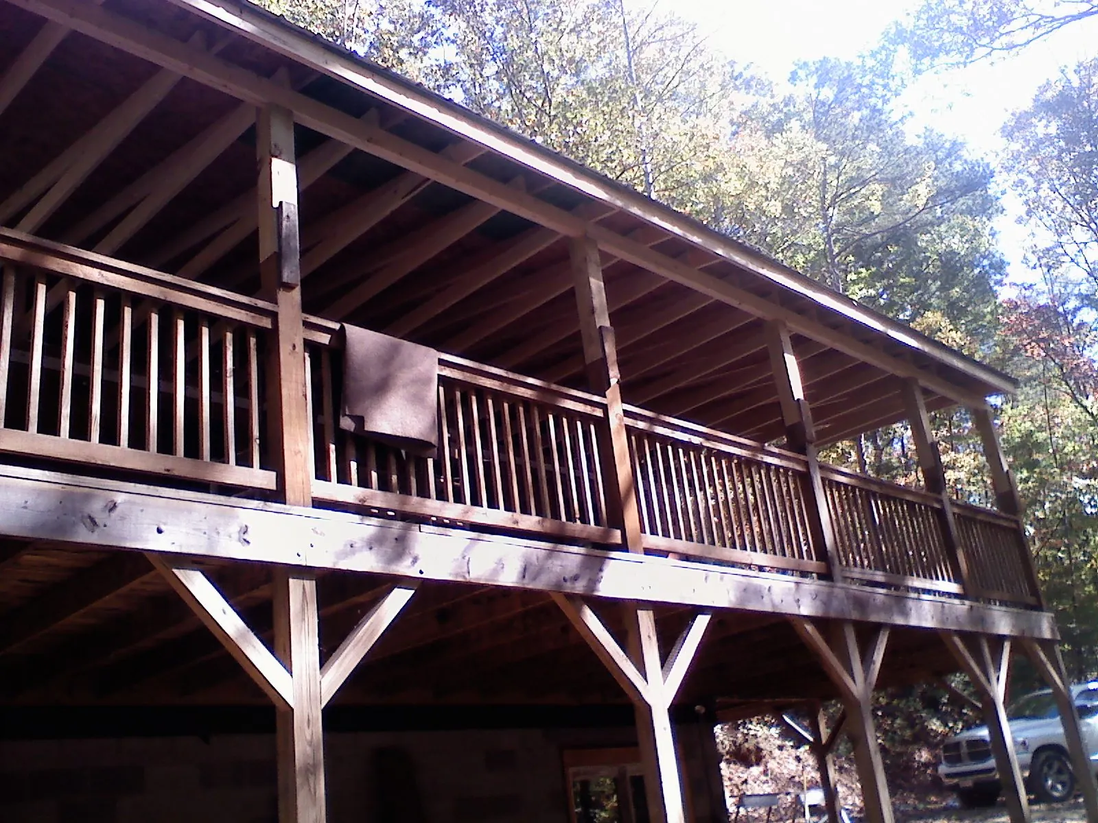 Timber framing under a new elevated porch and deck — Roof Leak Repair in Dubois by Roofing Brothers